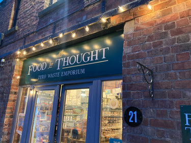 The Food For Thought Shop front at dusk